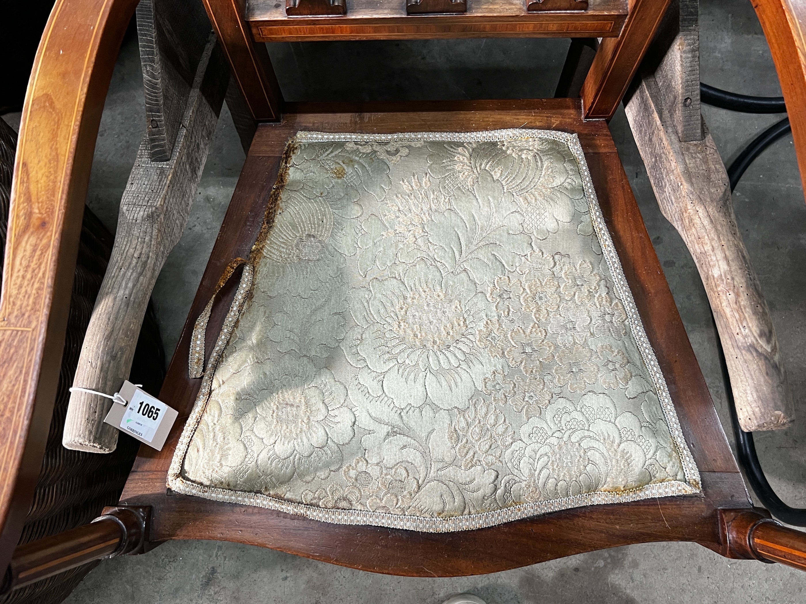 An Edwardian inlaid mahogany elbow chair, width 63cm, depth 44cm, height 122cm